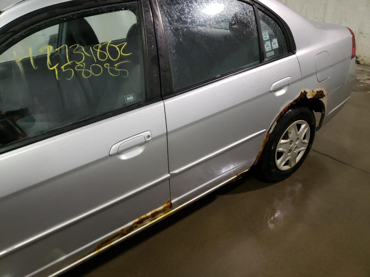 Photo 9 from auction – 2003 HONDA CIVIC LX with VIN 2HGES16583H526595