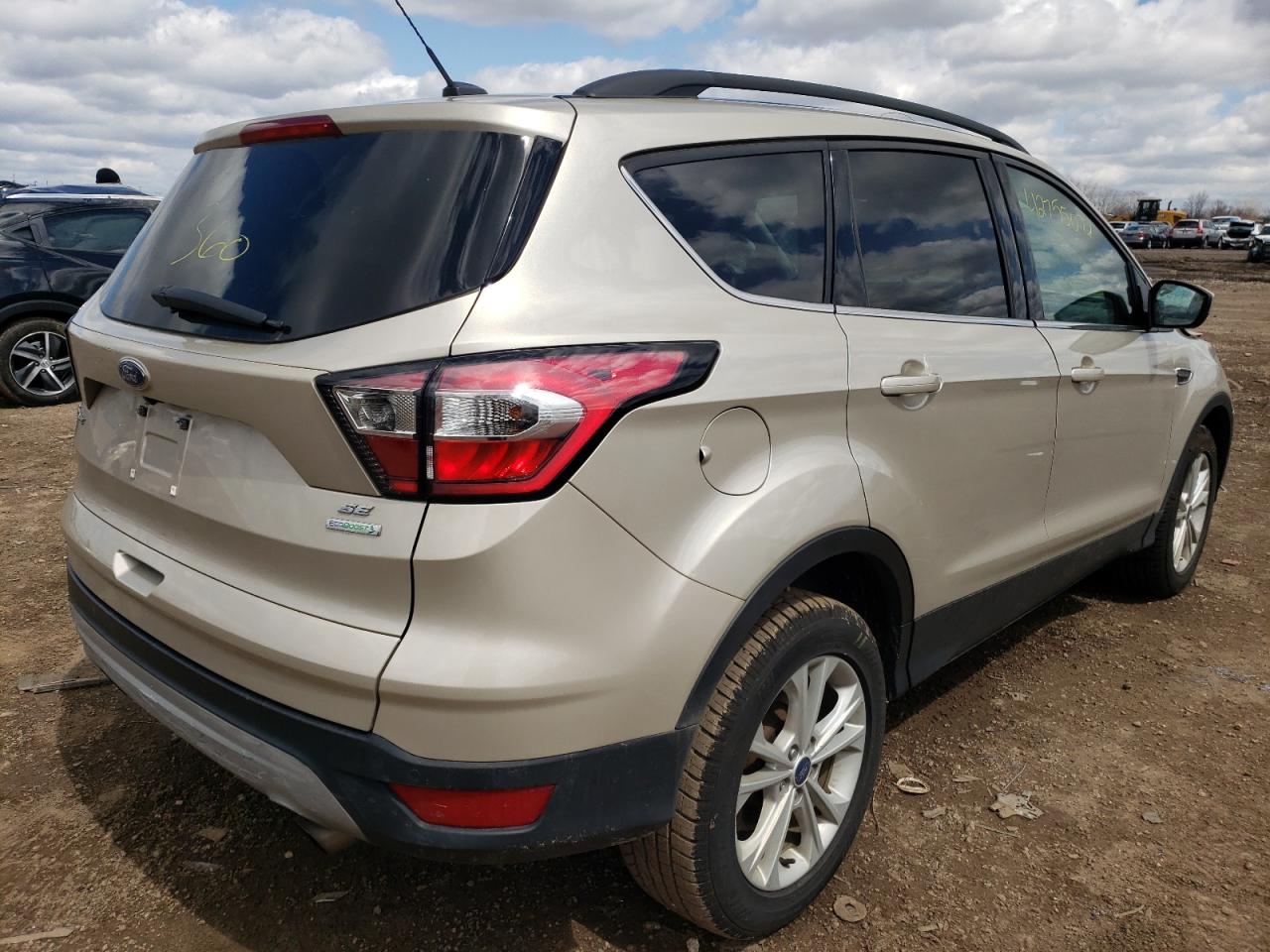 Photo 4 from auction – 2017 FORD ESCAPE SE with VIN 1FMCU0GD4HUB77631