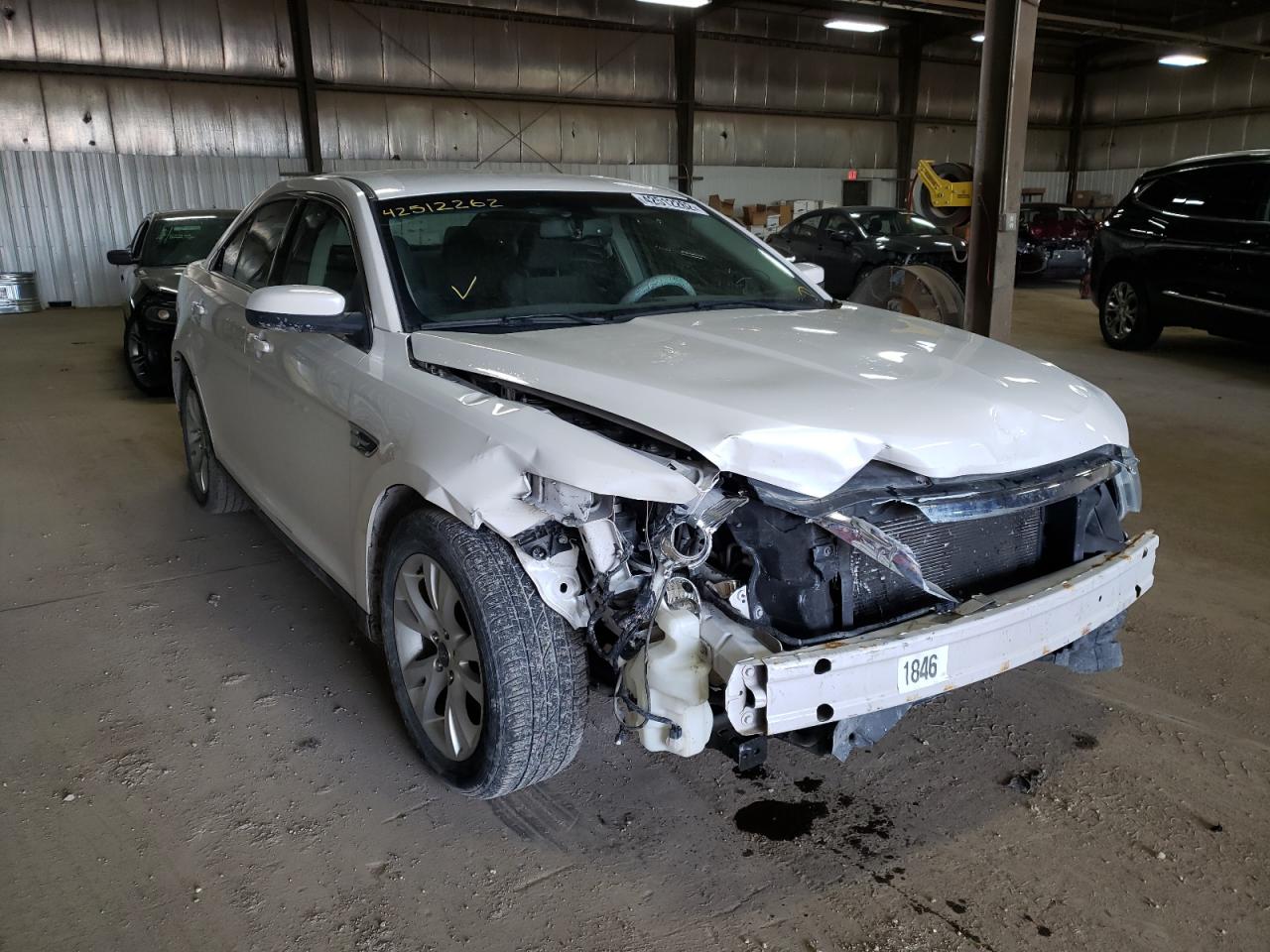 FORD TAURUS SEL 2010 with VIN 1FAHP2EW4AG123497 - Photo from auction