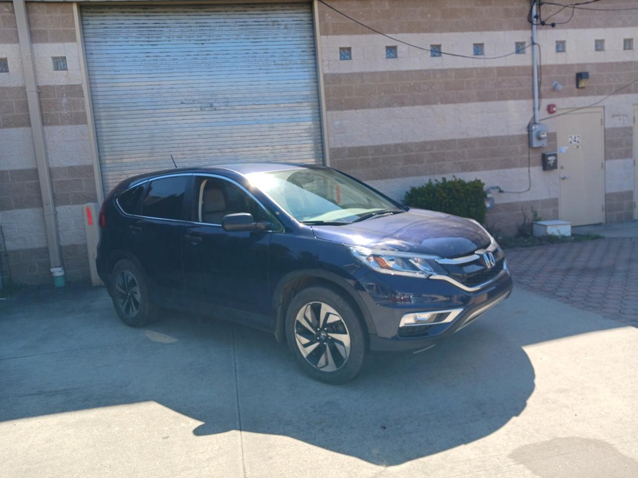 Photo 1 from auction – 2016 HONDA CR-V SE with VIN 2HKRM3H49GH562772