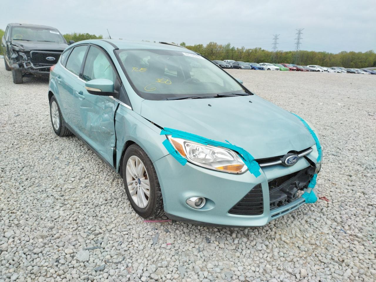 FORD FOCUS SEL 2012 with VIN 1FAHP3M28CL319859 - Photo from auction