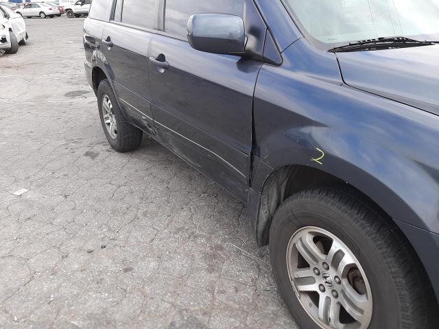 Photo 9 from auction – 2004 HONDA PILOT EX with VIN 2HKYF184X4H619504