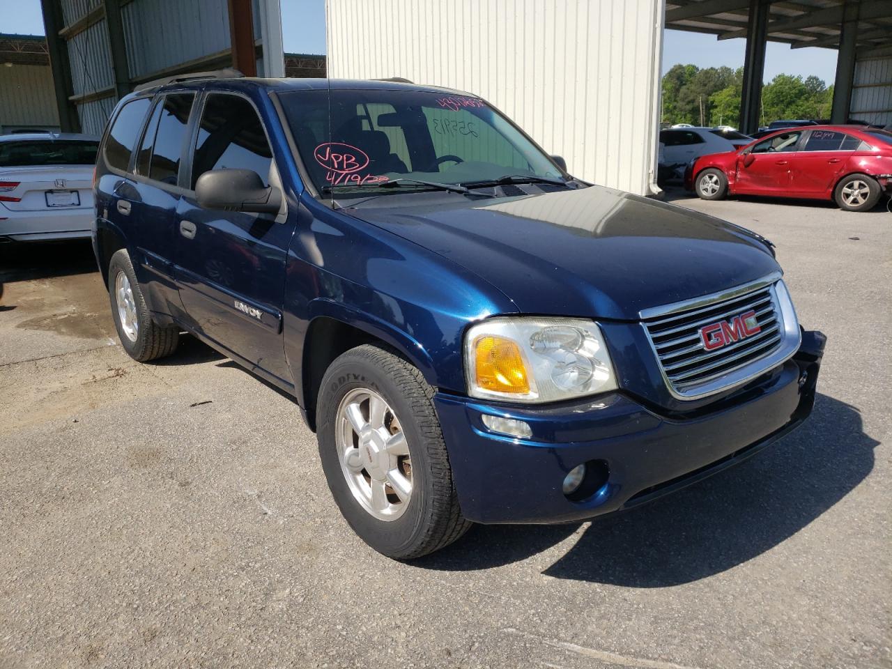 GMC ENVOY 2004 with VIN 1GKDS13SX42141977 - Photo from auction