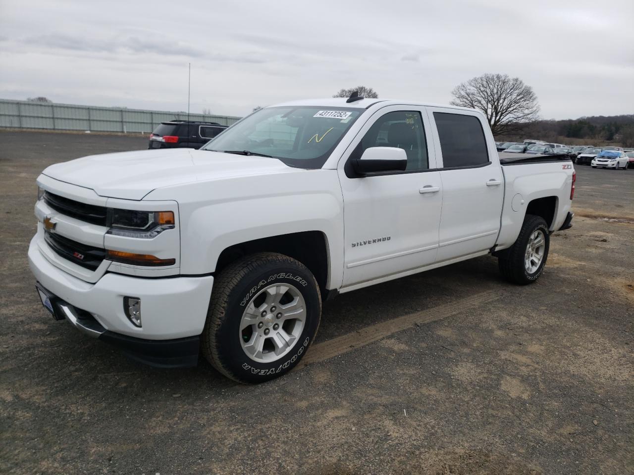 Photo 2 from auction – 2018 CHEVROLET SILVERADO with VIN 3GCUKREC8JG477663