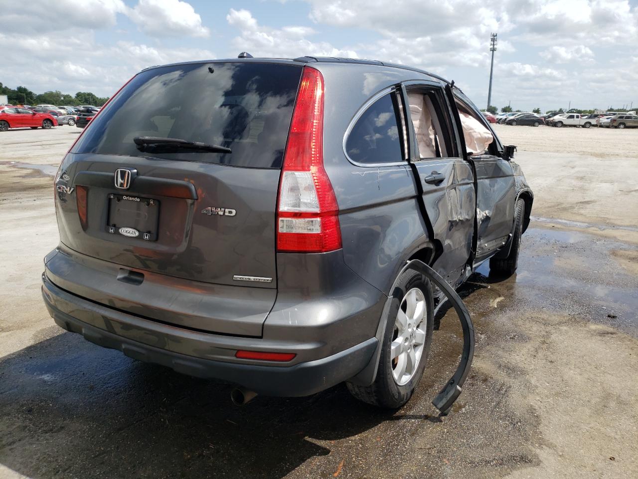 Photo 4 from auction – 2011 HONDA CR-V SE with VIN 5J6RE4H42BL066522