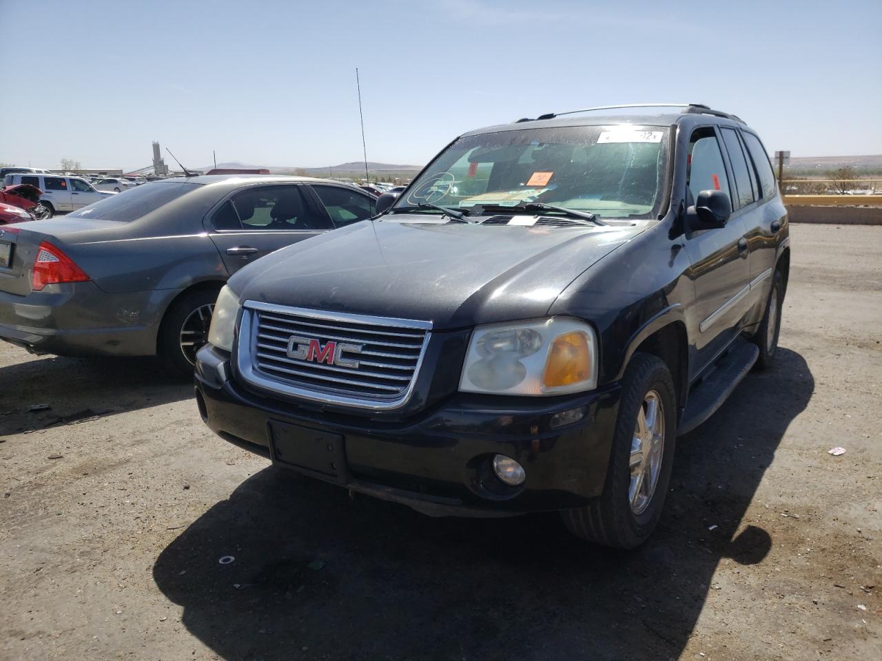 Photo 2 from auction – 2009 GMC ENVOY SLE with VIN 1GKDT33S892118634
