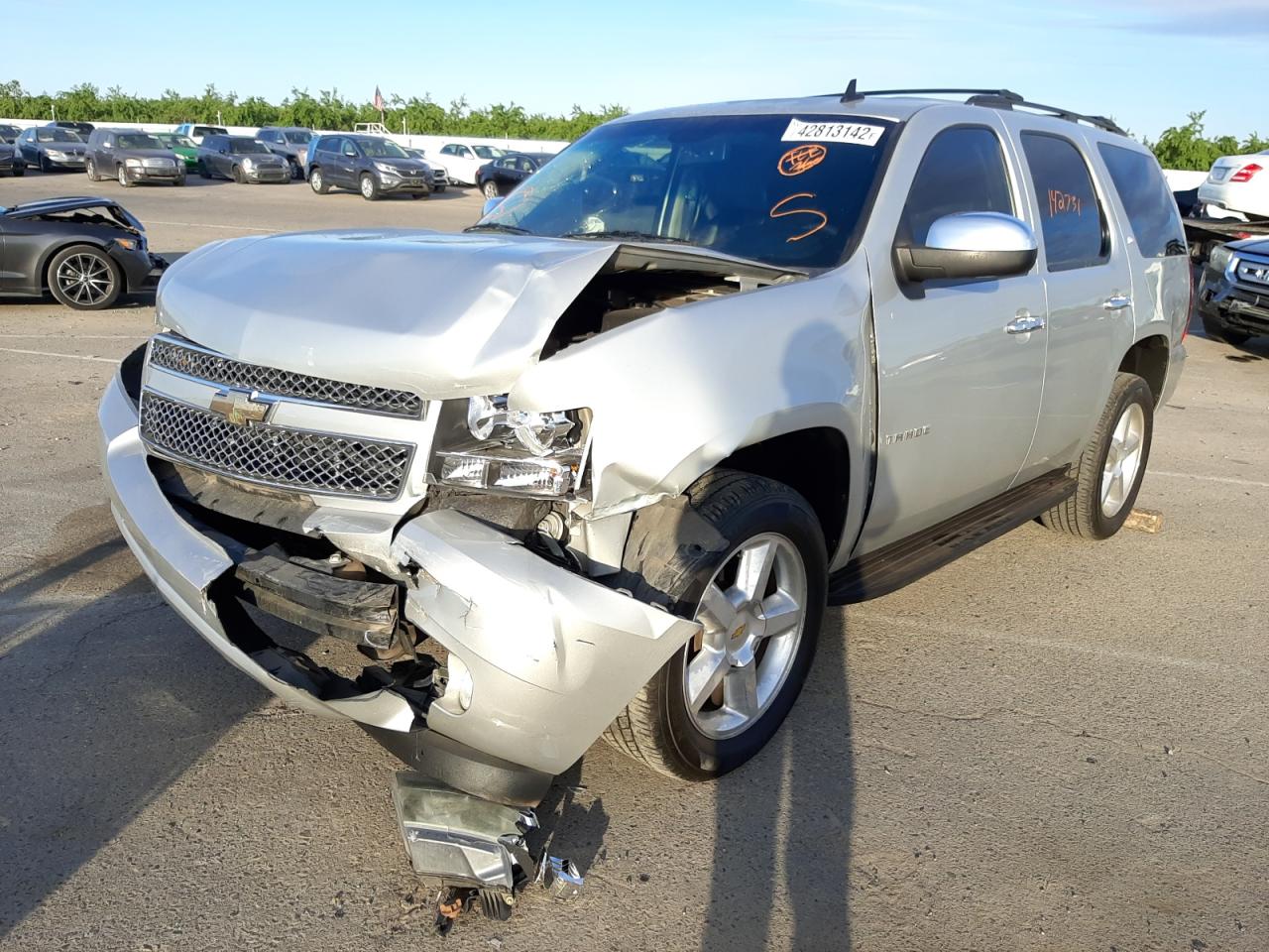 Photo 2 from auction – 2011 CHEVROLET TAHOE C150 with VIN 1GNSCBE03BR136388