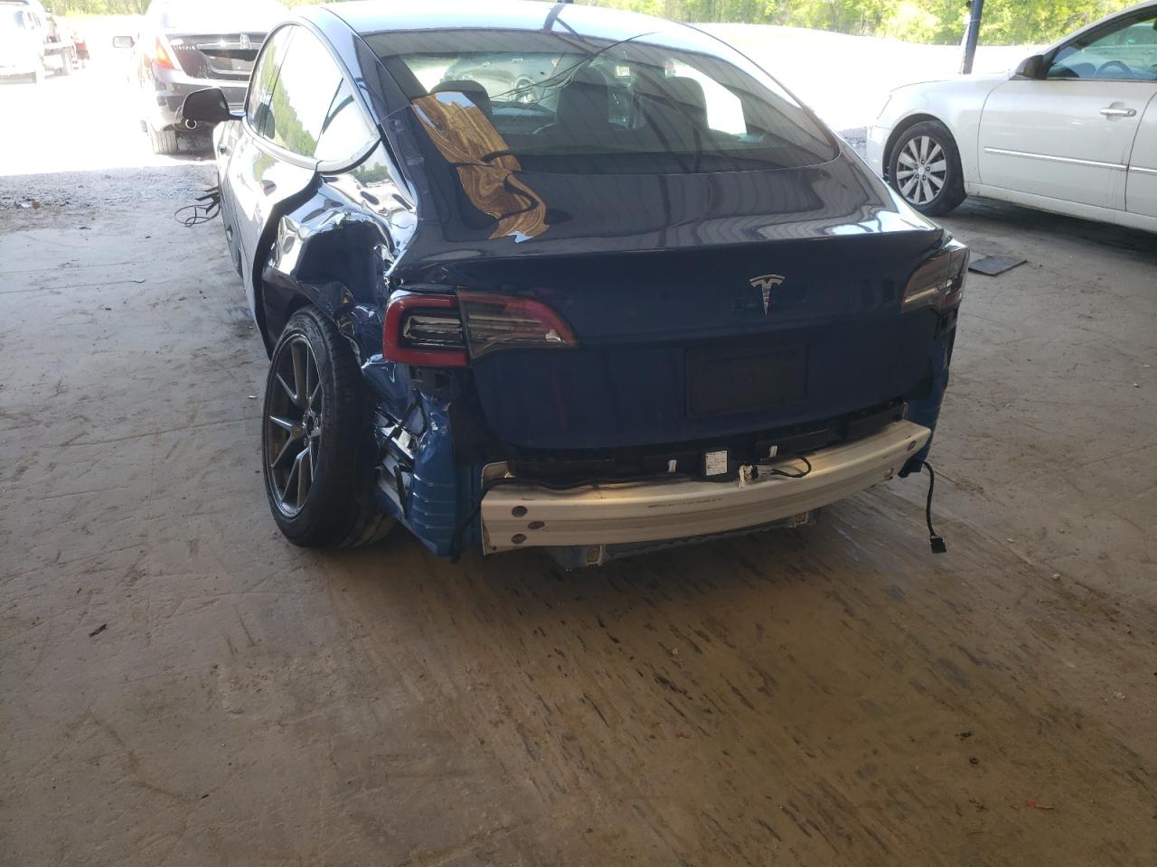 Photo 9 from auction – 2021 TESLA MODEL 3 with VIN 5YJ3E1EA6MF094463