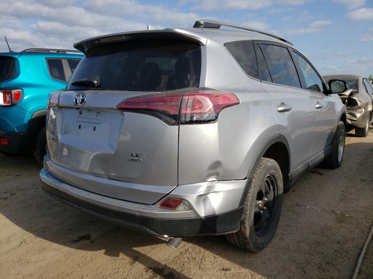 Photo 4 from auction – 2018 TOYOTA RAV4 LE with VIN 2T3BFREV1JW730285