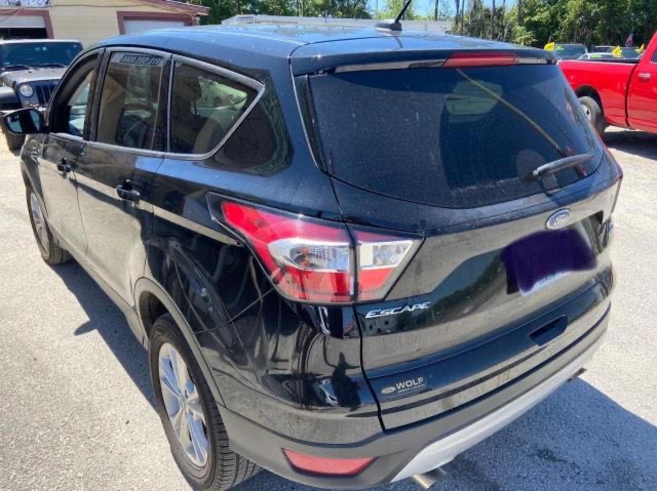 Photo 3 from auction – 2017 FORD ESCAPE SE with VIN 1FMCU9G98HUE75759