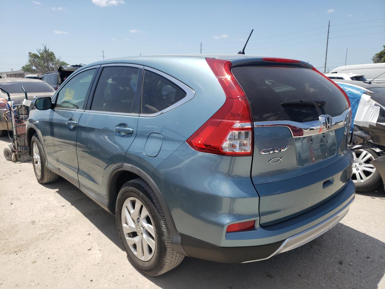 Photo 3 from auction – 2015 HONDA CR-V EX with VIN 2HKRM3H51FH539669