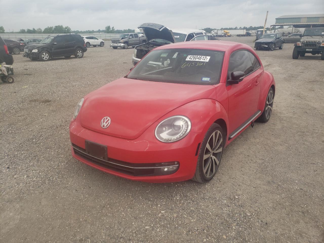 Photo 2 from auction – 2012 VOLKSWAGEN BEETLE TUR with VIN 3VWVA7AT7CM645361
