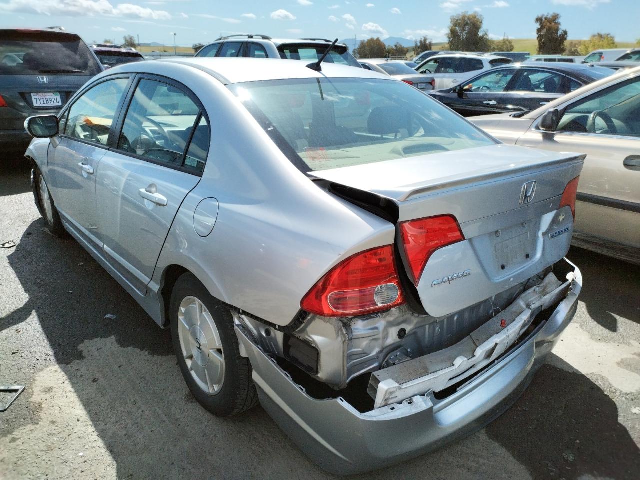 Photo 3 from auction – 2006 HONDA CIVIC HYBR with VIN JHMFA362X6S005574