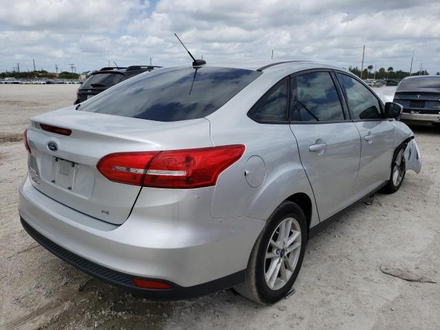 Foto 4 de la subasta – 2018 FORD FOCUS SE con VIN 1FADP3F28JL234559