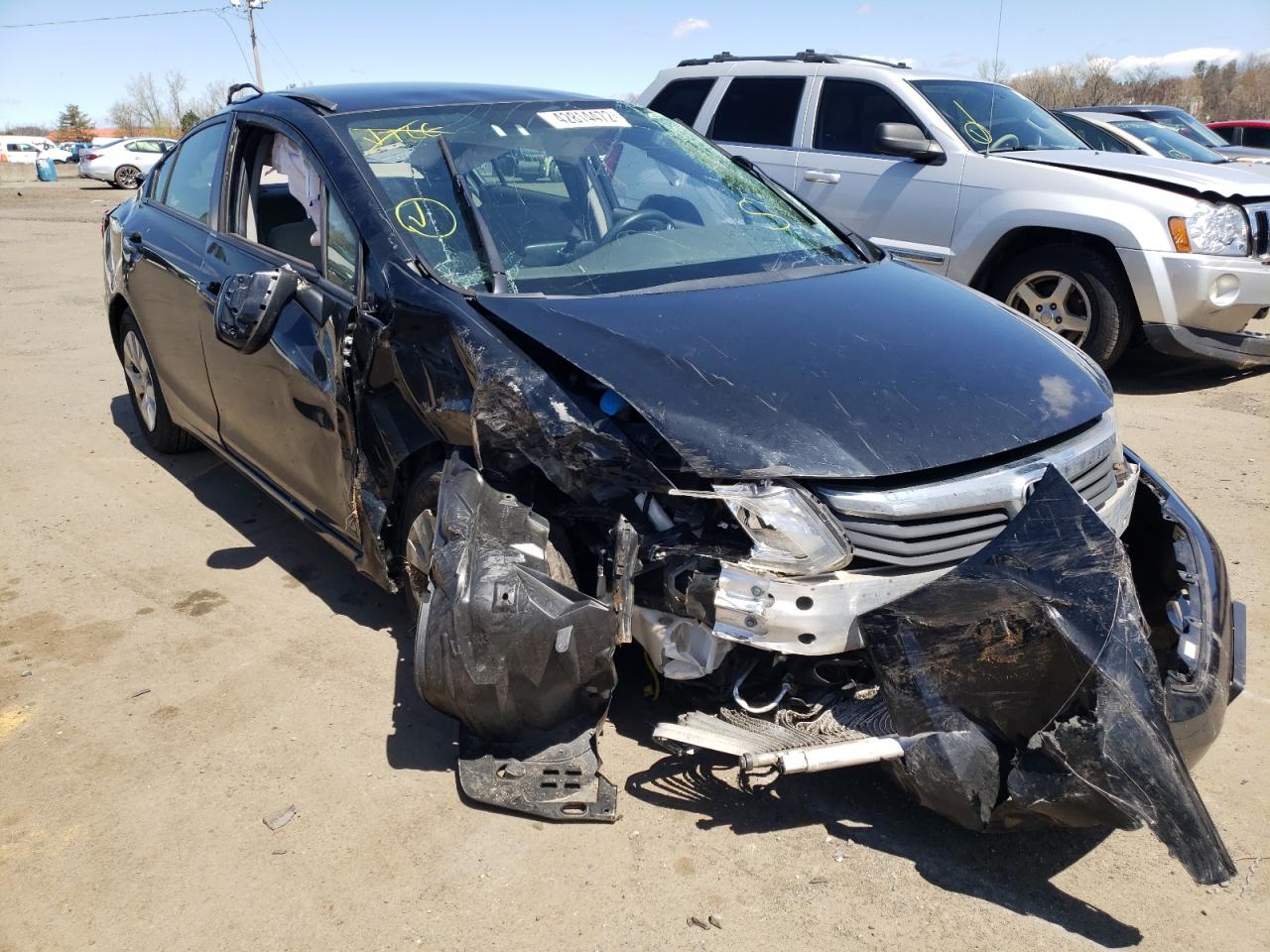 HONDA CIVIC LX 2012 with VIN JHMFB2F56CS005648 - Photo from auction