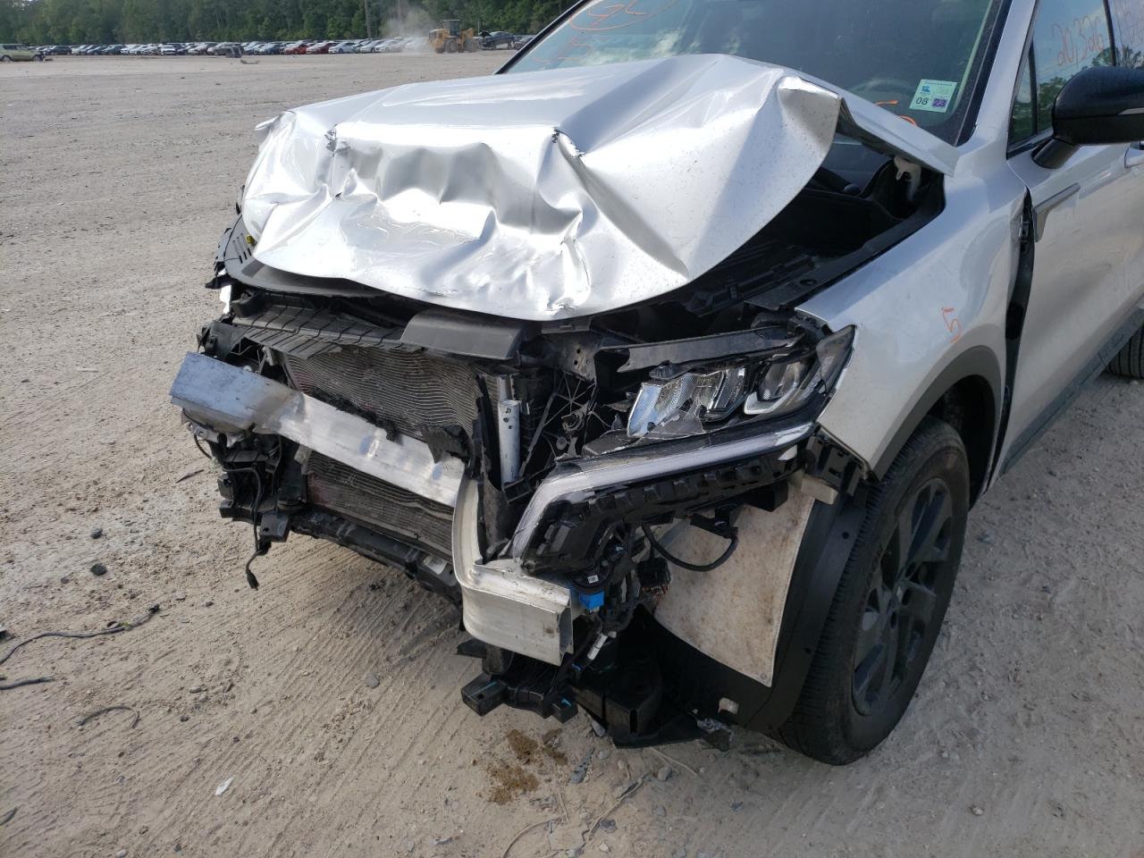 Photo 9 from auction – 2021 KIA SORENTO S with VIN 5XYRLDLC0MG069783