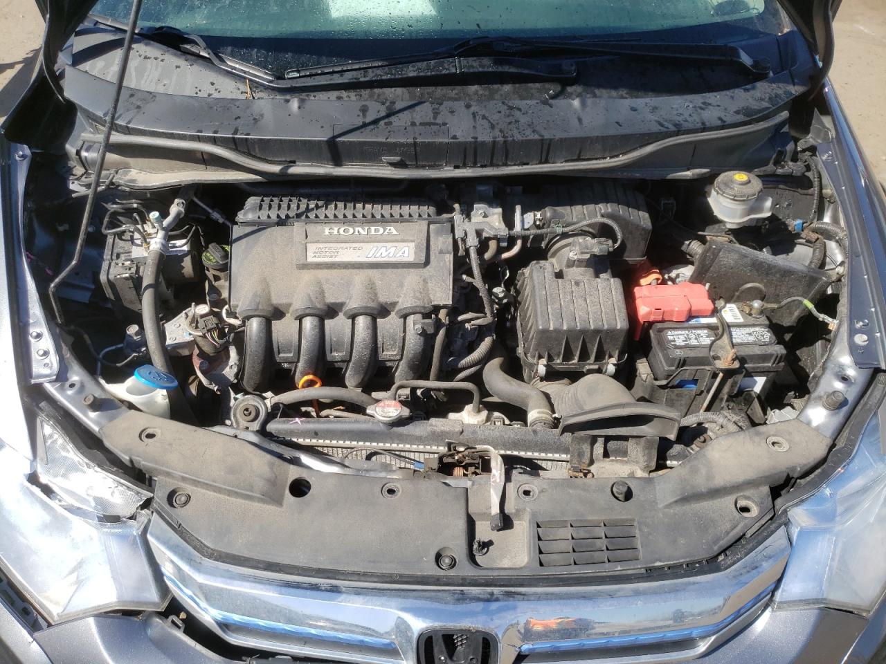 Photo 7 from auction – 2014 HONDA INSIGHT with VIN JHMZE2H34ES000306