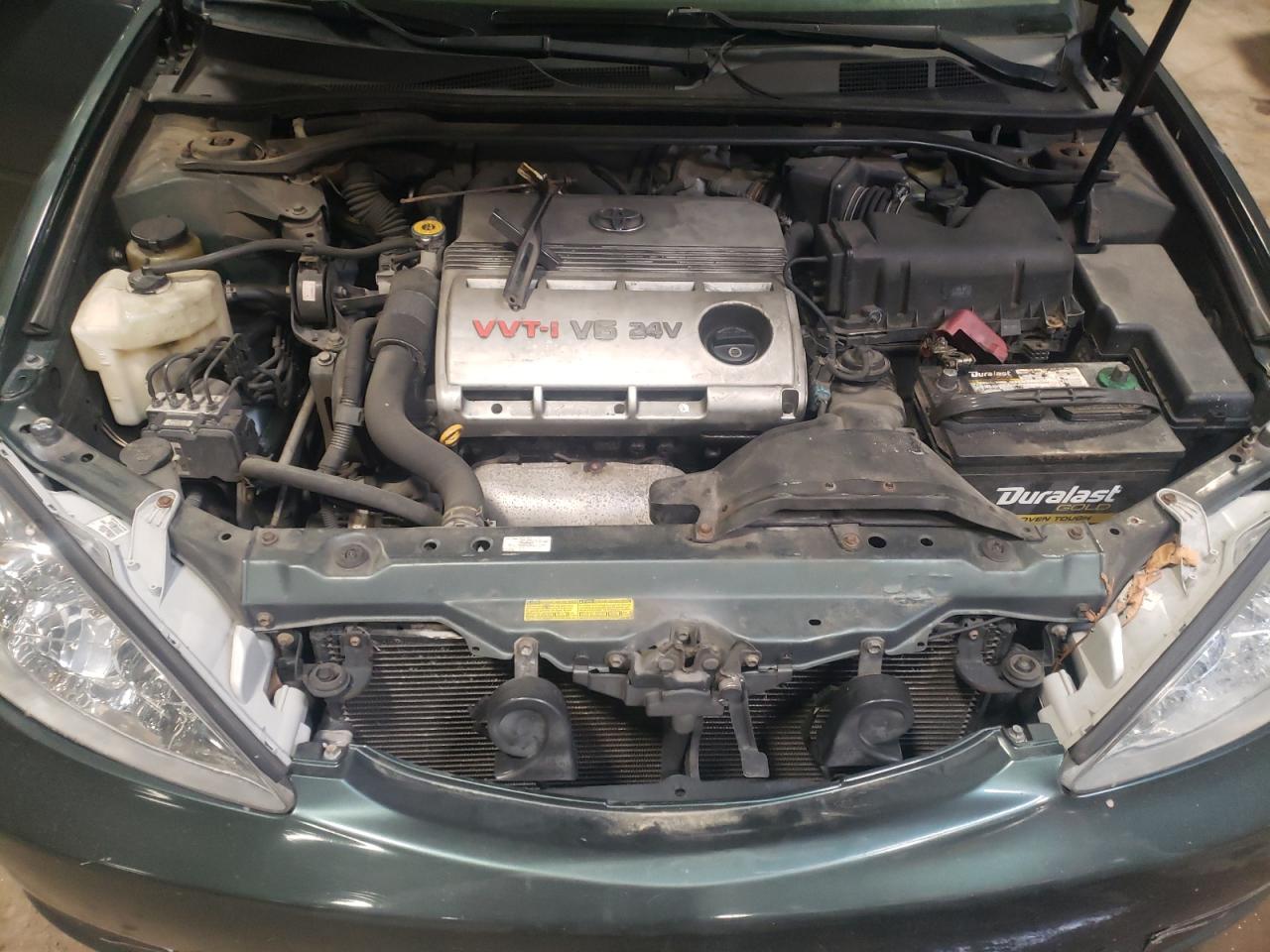 Photo 7 from auction – 2004 TOYOTA CAMRY LE with VIN 4T1BF30K34U075280