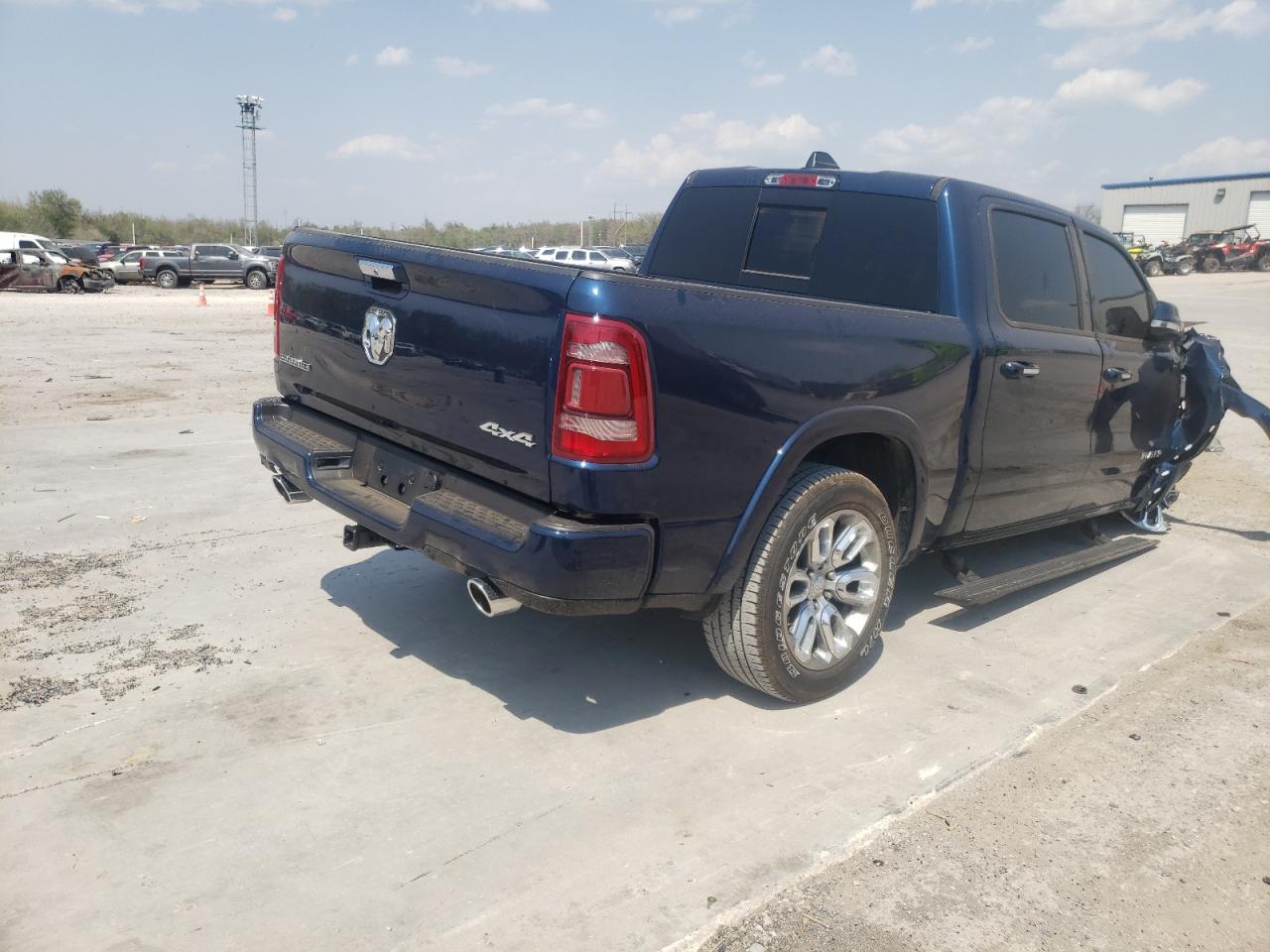 Photo 4 from auction – 2021 RAM 1500 LARAM with VIN 1C6SRFJTXMN699616