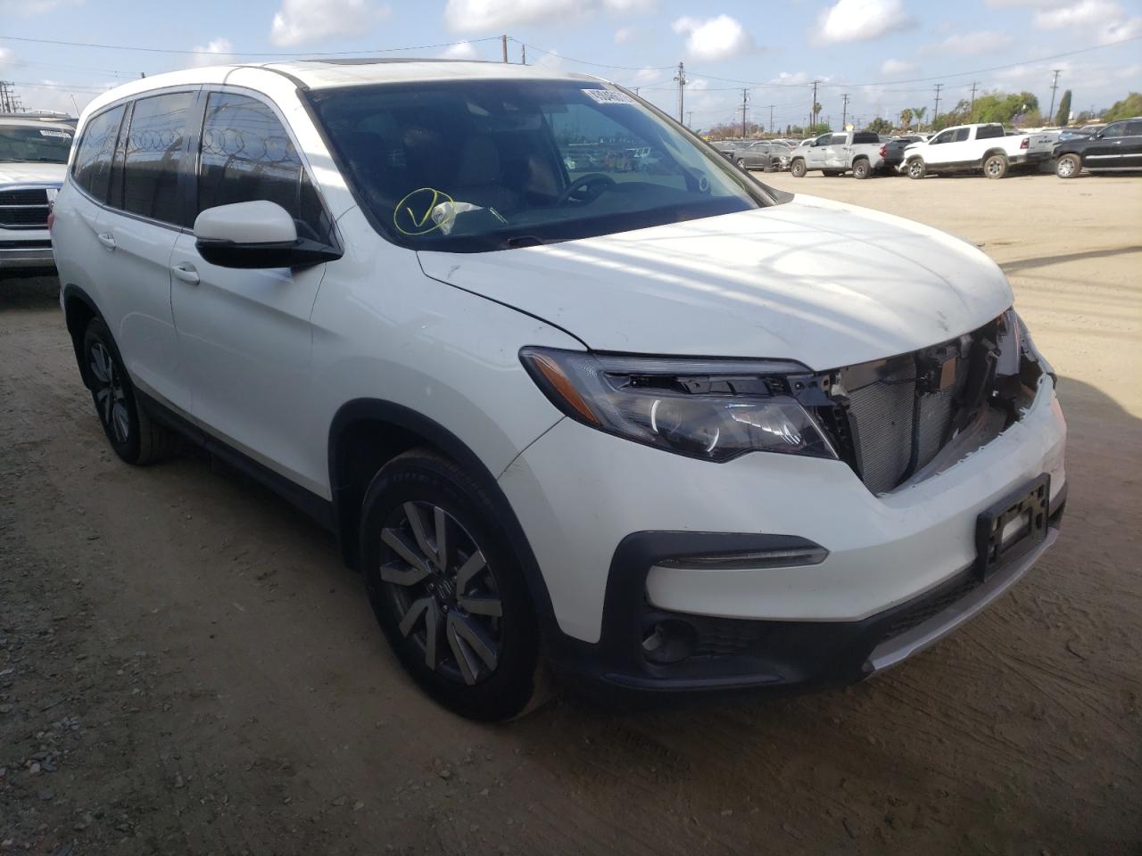 HONDA PILOT EXL 2021 with VIN 5FNYF5H52MB033233 - Photo from auction