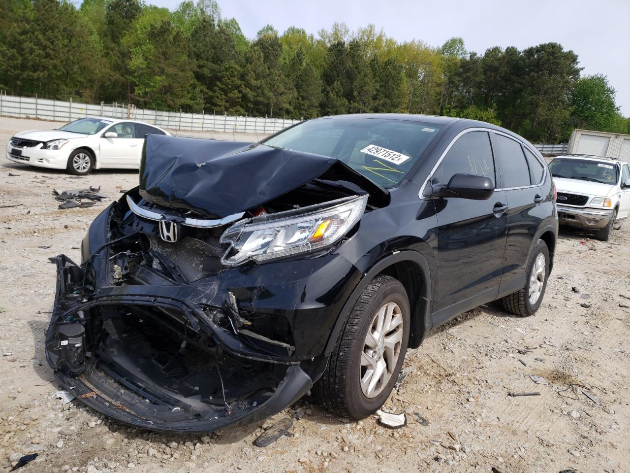 Photo 2 from auction – 2015 HONDA CR-V EX with VIN 2HKRM4H59FH678079