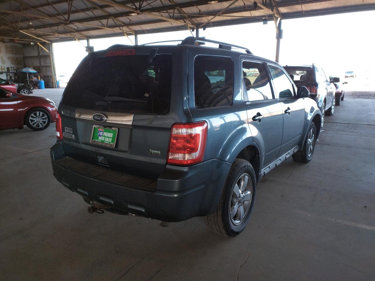 Photo 4 from auction – 2011 FORD ESCAPE LIM with VIN 1FMCU9EG8BKC10800