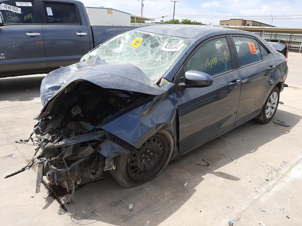 Photo 2 from auction – 2014 TOYOTA COROLLA L with VIN 2T1BURHE6EC184679