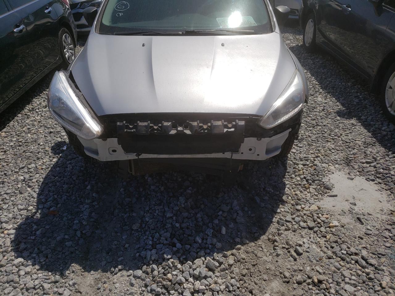 Photo 10 from auction – 2016 FORD FOCUS S with VIN 1FADP3E2XGL352994