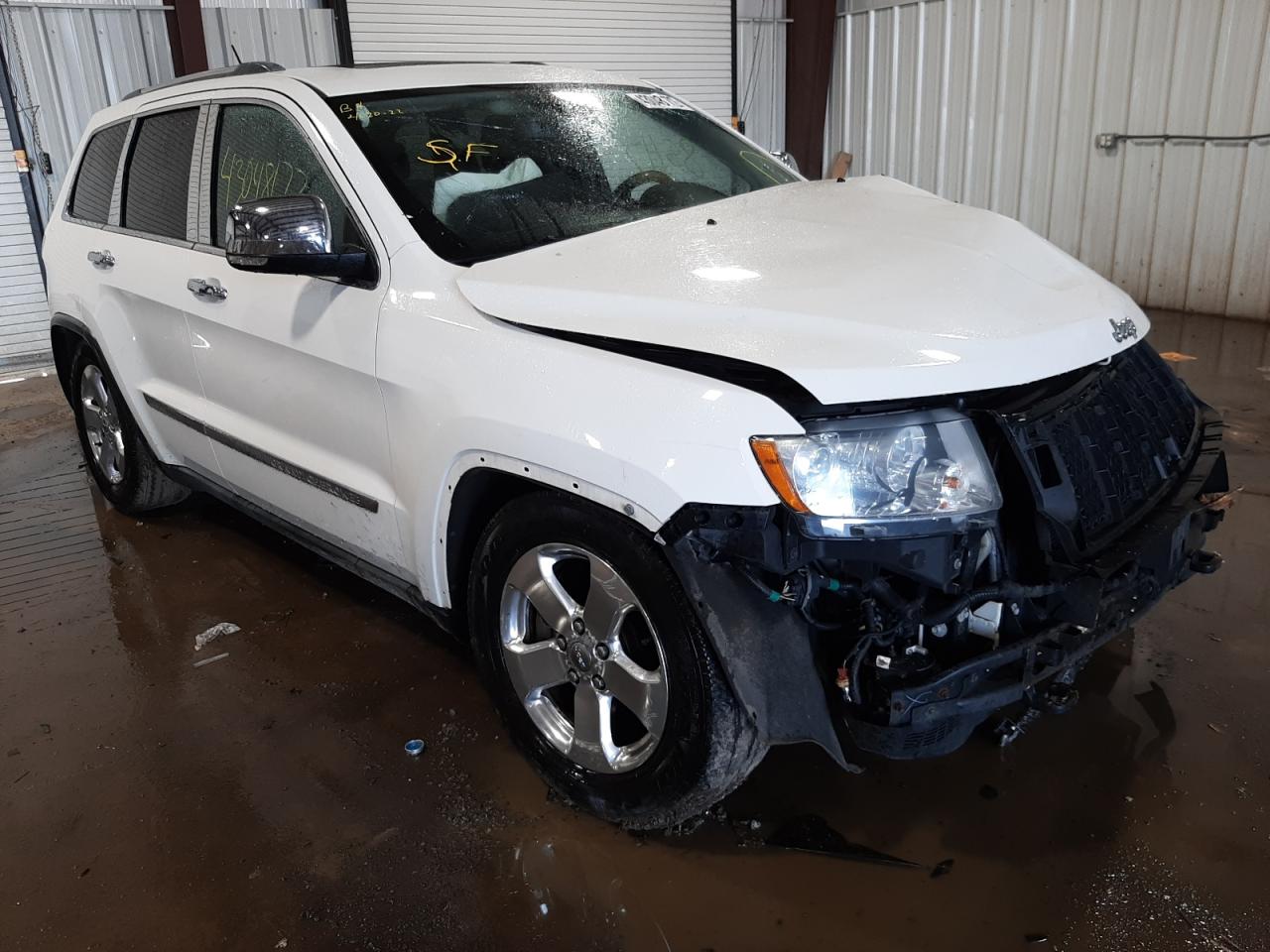 JEEP GRAND CHER 2011 with VIN 1J4RR6GT5BC686581 - Photo from auction