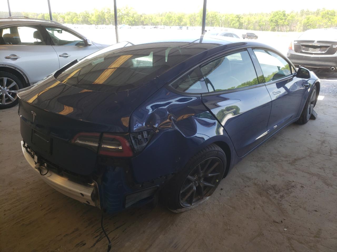 Photo 4 from auction – 2021 TESLA MODEL 3 with VIN 5YJ3E1EA6MF094463