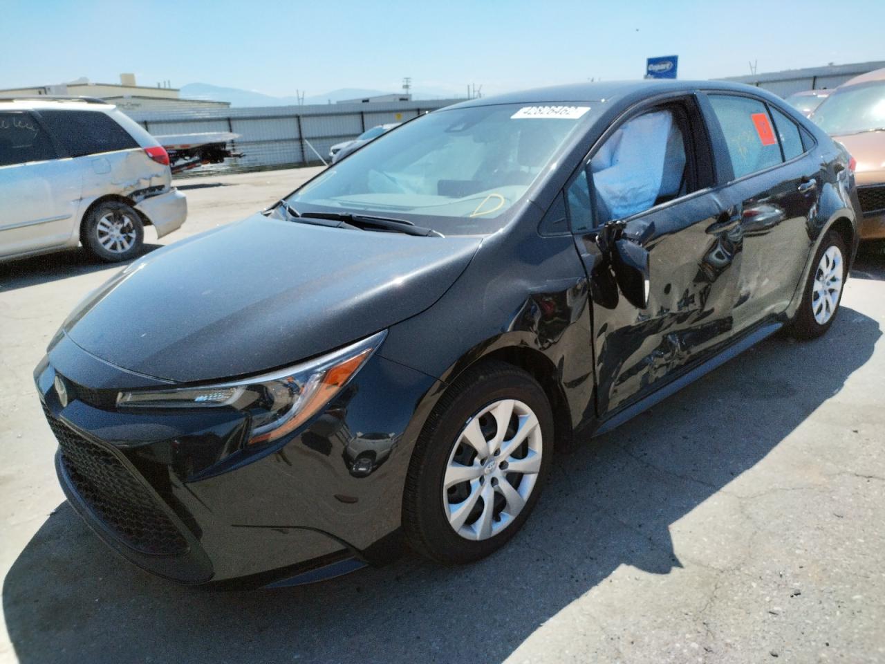 Photo 2 from auction – 2021 TOYOTA COROLLA LE with VIN JTDEPMAE2MJ188197