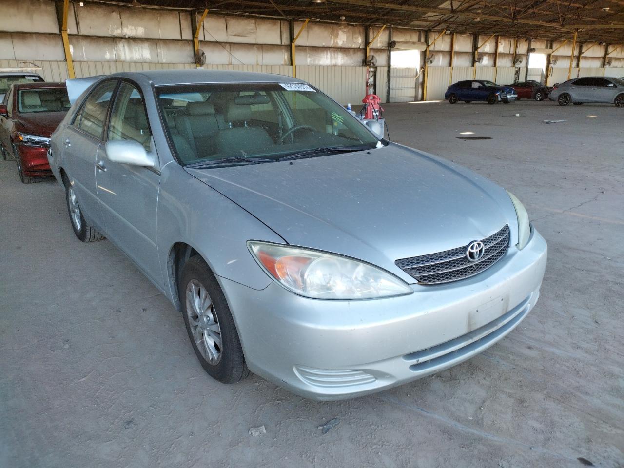 TOYOTA CAMRY LE 2004 with VIN 4T1BF32K14U070530 - Photo from auction