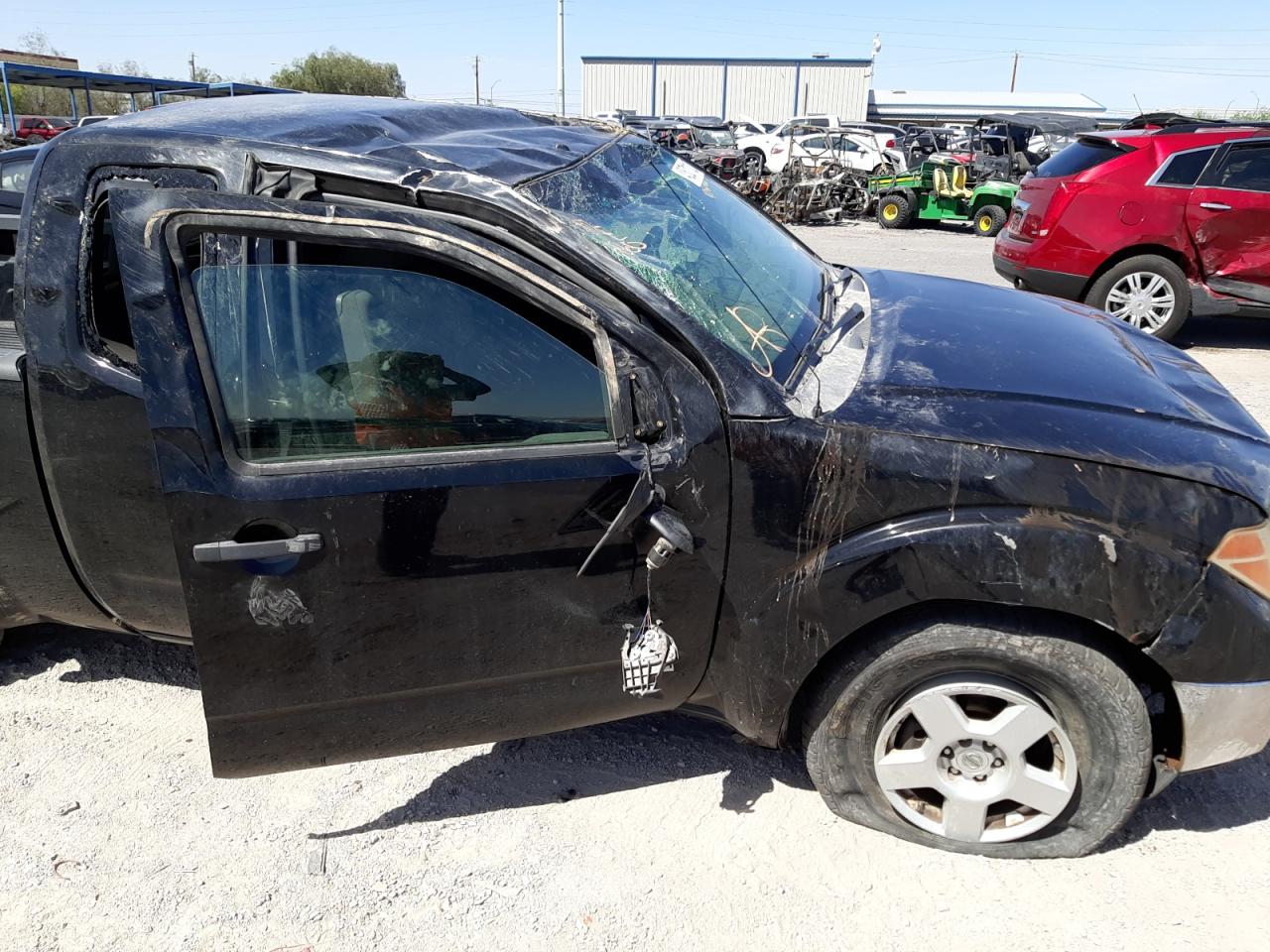 Photo 9 from auction – 2006 NISSAN FRONTIER K with VIN 1N6AD06U06C440873