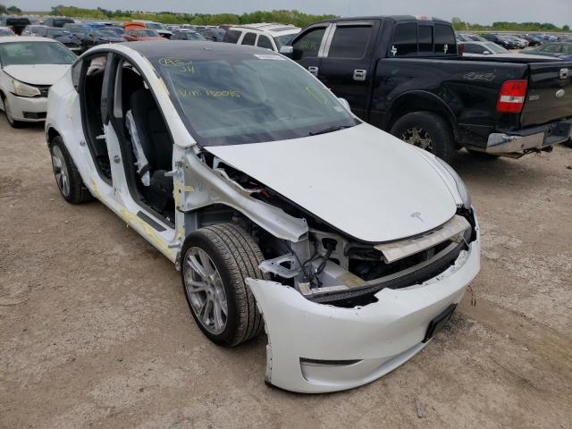 TESLA MODEL Y 2021 with VIN 5YJYGAEE4MF150015 - Photo from auction