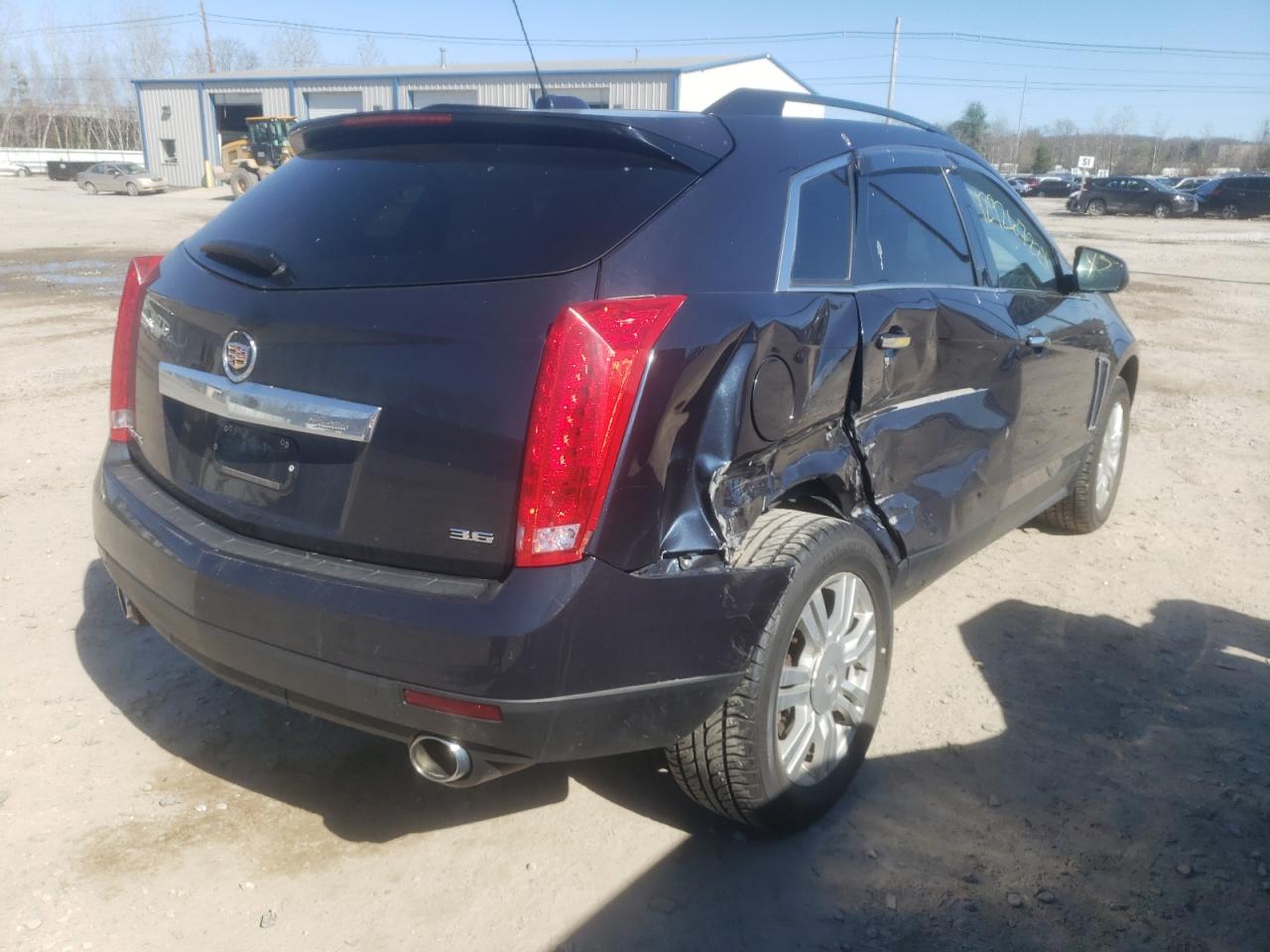 Foto 4 de la subasta – 2015 CADILLAC SRX con VIN 3GYFNAE37FS571680