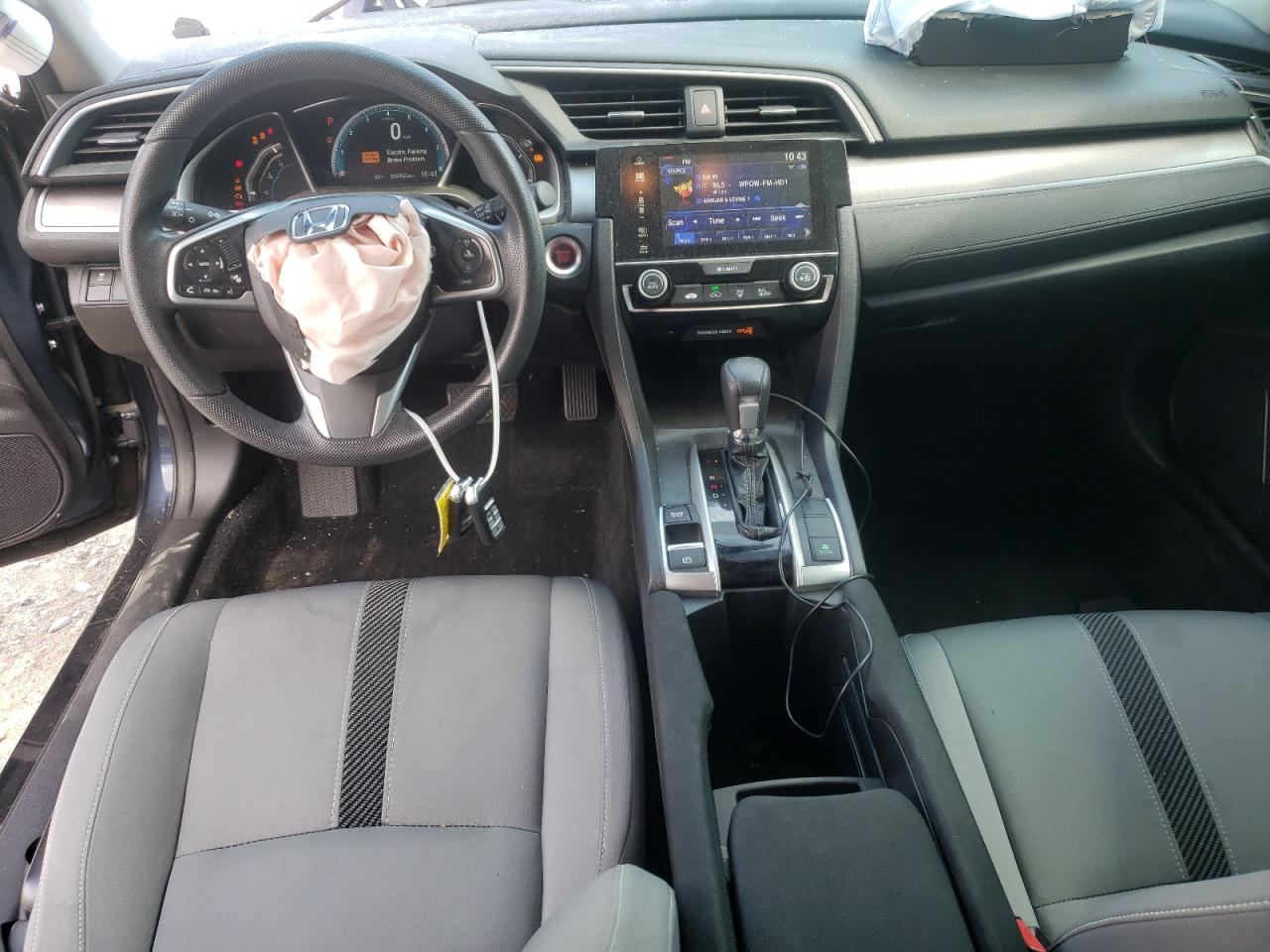 Photo 9 from auction – 2018 HONDA CIVIC EX with VIN 19XFC2F79JE016353