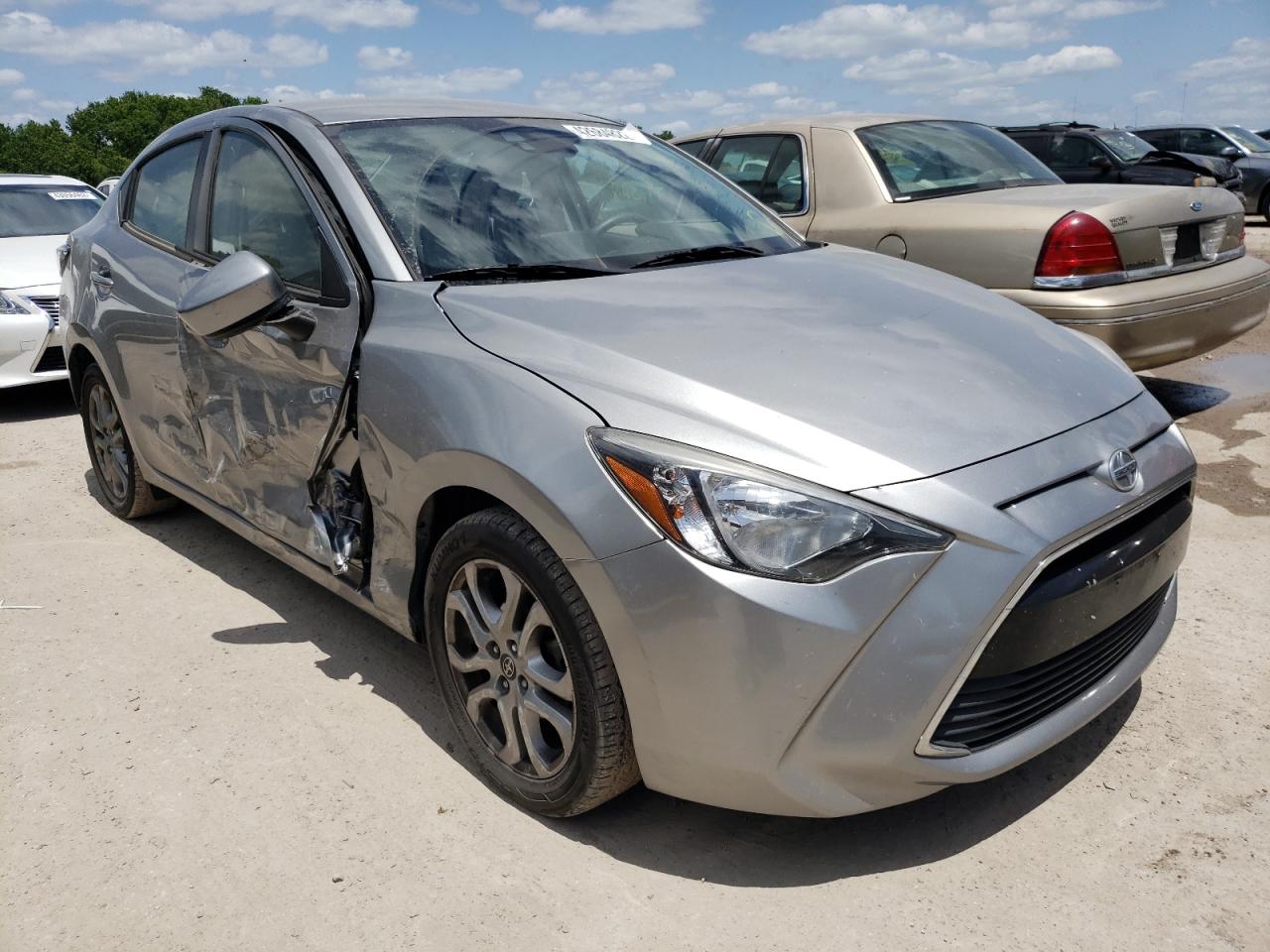 SCION IA 2016 with VIN 3MYDLBZV9GY124174 - Photo from auction