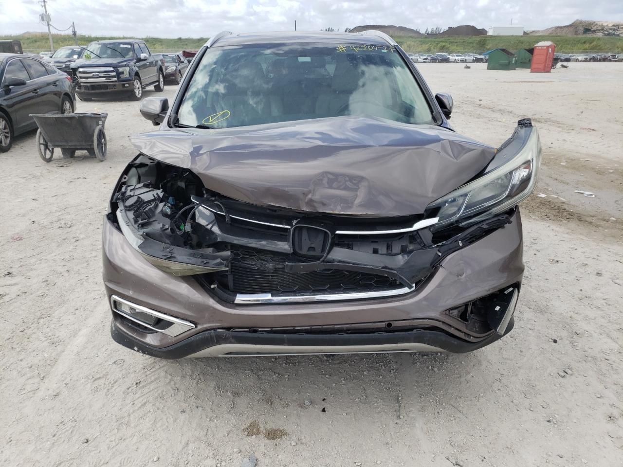 Photo 9 from auction – 2016 HONDA CR-V EXL with VIN 2HKRM3H78GH529997