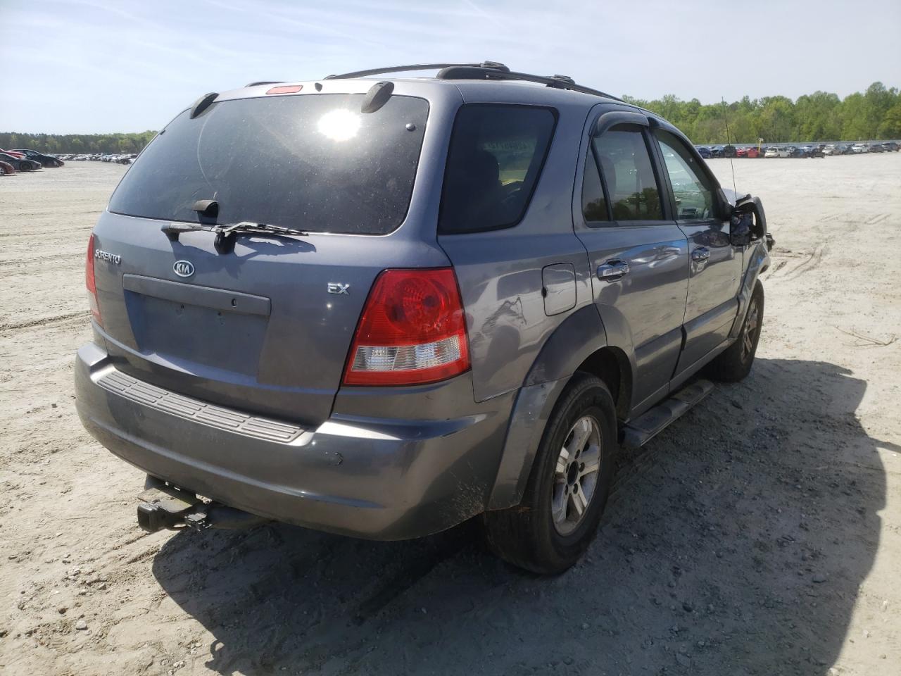 Photo 4 from auction – 2004 KIA SORENTO EX with VIN KNDJD733445308224