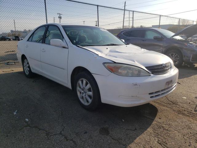 TOYOTA CAMRY LE 2002 with VIN 4T1BF30K62U011277 - Photo from auction