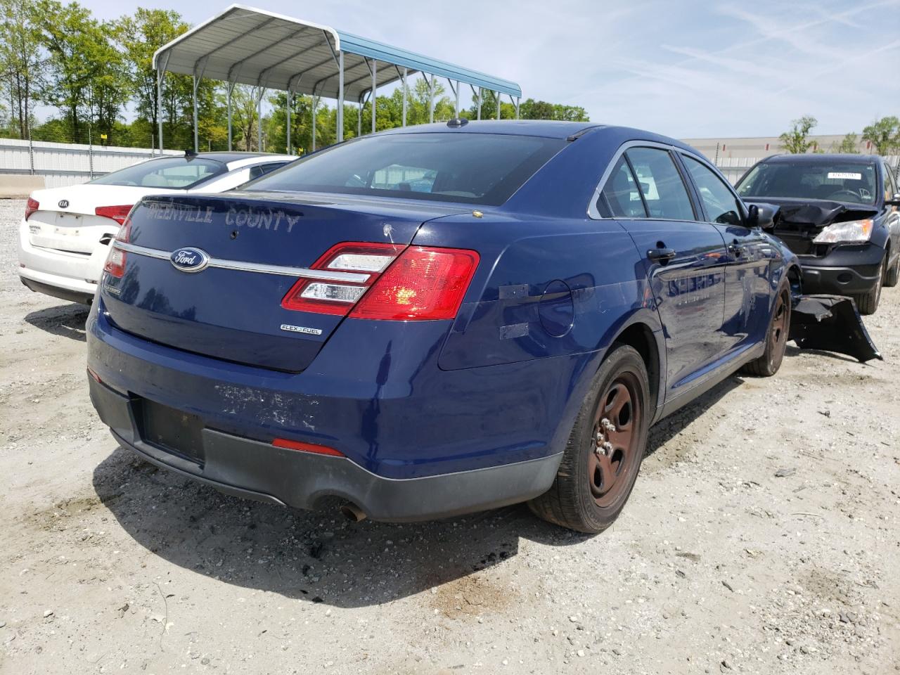 Photo 4 from auction – 2015 FORD TAURUS POL with VIN 1FAHP2L8XFG126092