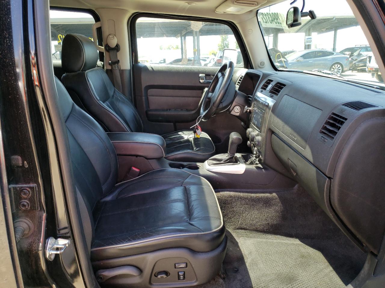 Photo 5 from auction – 2007 HUMMER H3 with VIN 5GTDN13E178186443