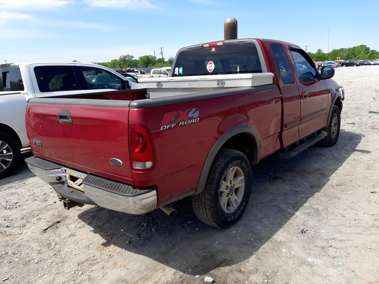 Photo 4 from auction – 2002 FORD F150 with VIN 1FTRX18L52NB76944