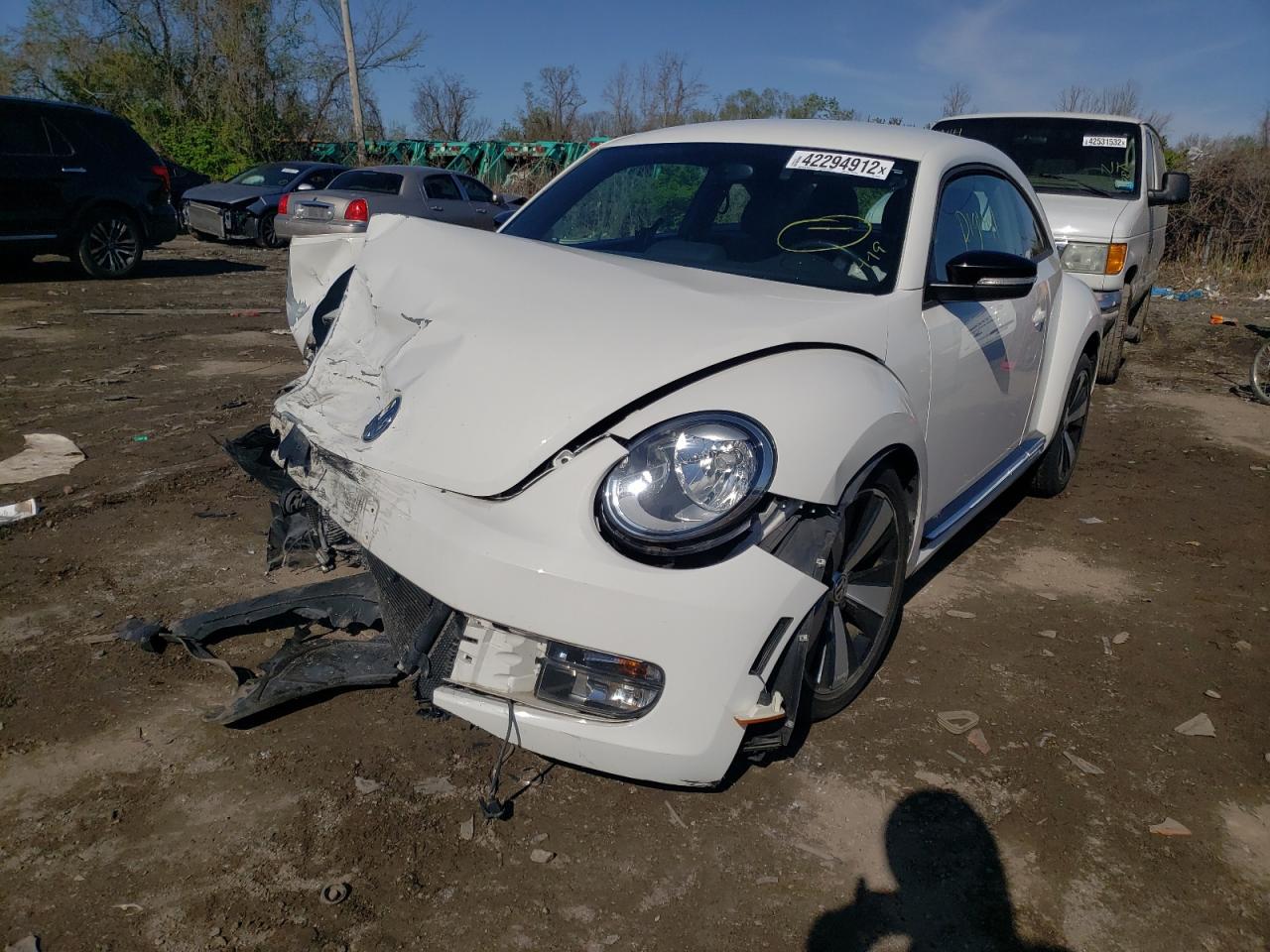 Photo 2 from auction – 2012 VOLKSWAGEN BEETLE TUR with VIN 3VWVA7AT9CM660413