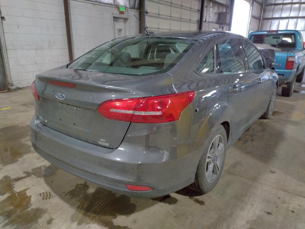 Photo 3 from auction – 2018 FORD FOCUS SE with VIN 1FADP3FE8JL304670
