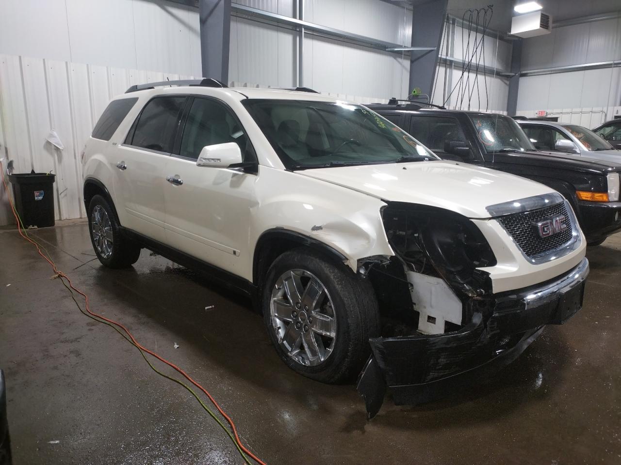 GMC ACADIA SLT 2010 with VIN 1GKLVNED3AJ128935 - Photo from auction