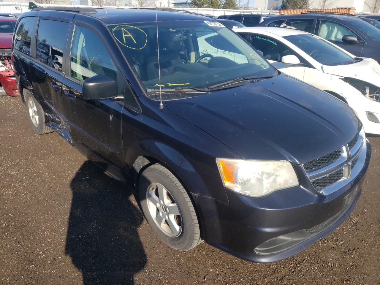 DODGE GRAND CARA 2011 with VIN 2D4RN4DG8BR724912 - Photo from auction