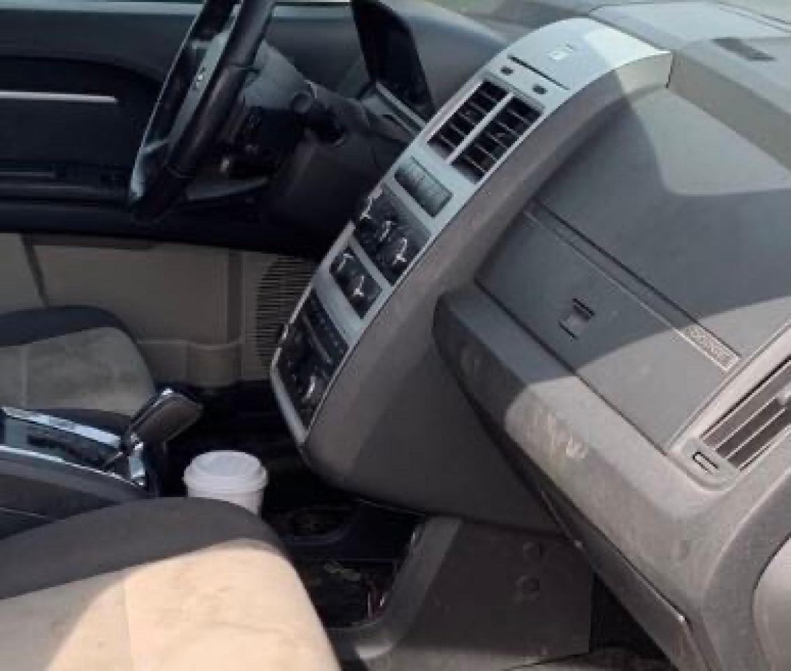 Photo 9 from auction – 2009 DODGE JOURNEY SX with VIN 3D4GG57V99T506308