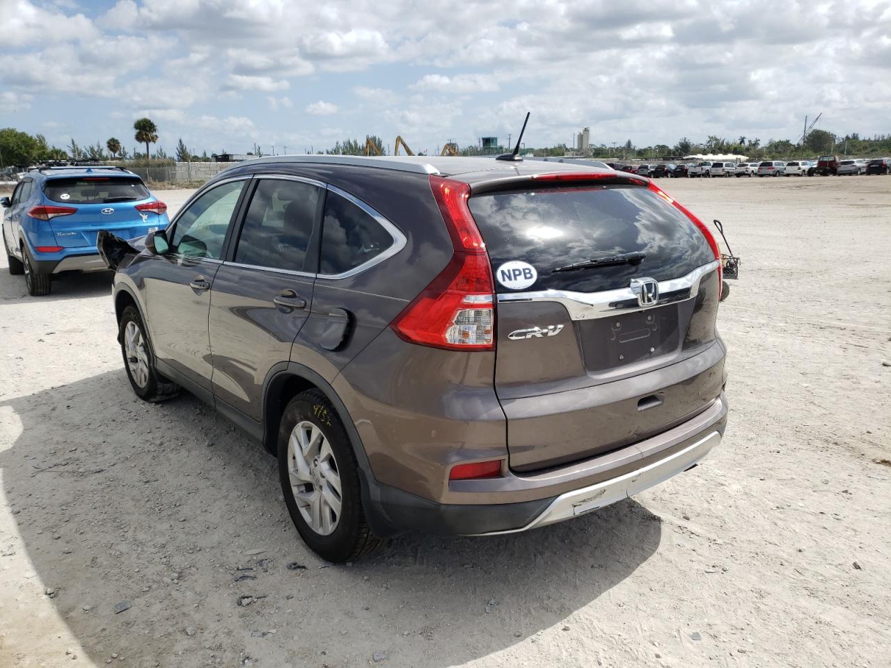Photo 3 from auction – 2016 HONDA CR-V EXL with VIN 2HKRM3H78GH529997
