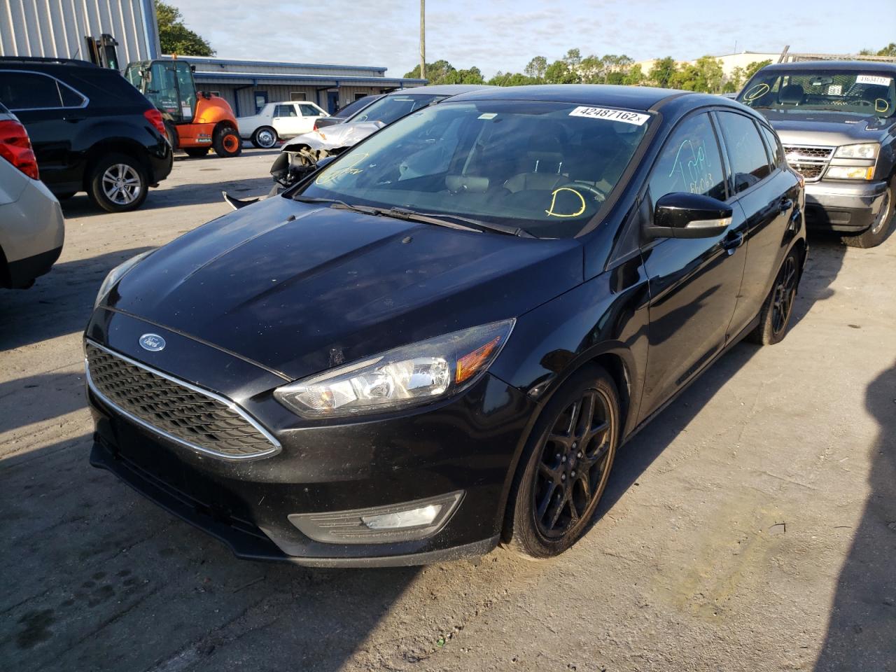 Photo 2 from auction – 2016 FORD FOCUS SE with VIN 1FADP3K29GL356247